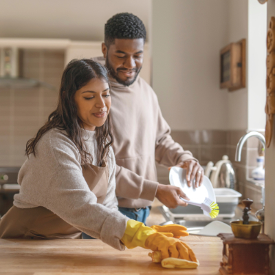 Cleaning a kitchen counter after food preparation